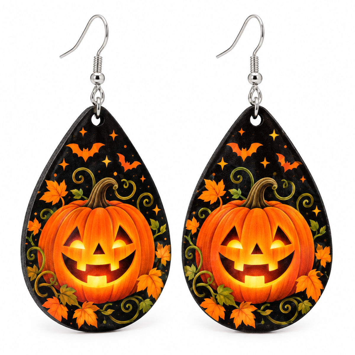 Witch hat Halloween teardrop earrings with stars, moons, and a purple Halloween design